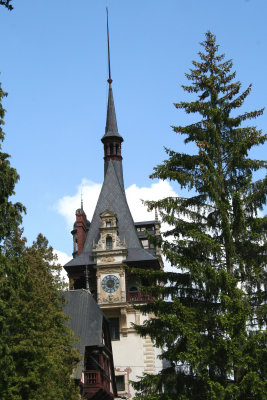 View of clock tower and steeple of Peles Castle.