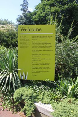 Sign welcoming visitors to Wave Hill and laying down the garden's ground rules.