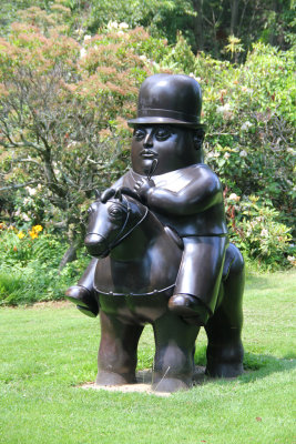 Close-up of Man on Horseback. Botero depicts portly figures in his art.