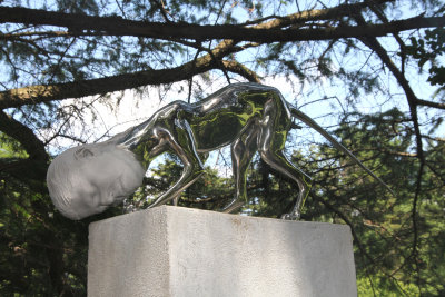 A stainless steel sculpture by American sculptor Rona Pondick called Fox (1998-99) of a part man and part fox.