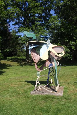 Welded and polychromed steel sculpture by American sculptor Peter Reginato entitled Casanova Brown (1987).