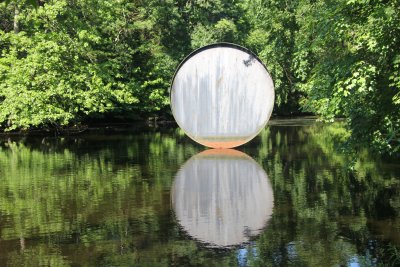 Closer view of the steel sculpture. The reflection becomes part of the sculpture.