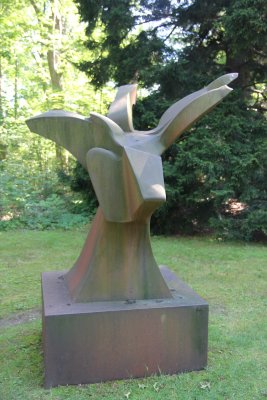A cor-ten steel sculpture by Chicago artist Richard Hunt called Europa Hybrid (1977).