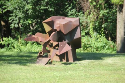 Another cor-ten steel assembly by Chicago artist Richard Hunt called Sparrow Hill: Incline and Extension (1975).