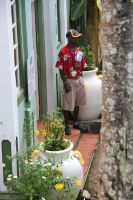 Doorman in a colorful Caribbean shirt at Caribelle Batik.