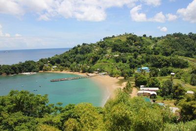 The small fishing village at Parlatuvier Beach gives the crescent-shaped beach a charming and rustic appeal.