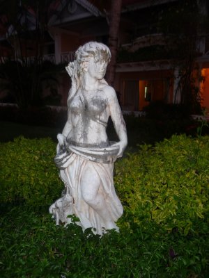 Hotel statue at dusk.