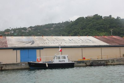 On the rooftop of this factory, it is written St. Lucia Simply Beautiful.