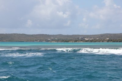 Note the unusual turquoise blue water along the Antigua coastline.