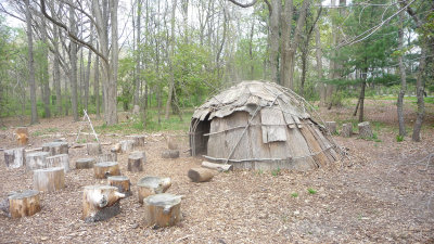 Wigwam and tree stump seats.  A good place for a pow wow or for kids in the Native American School Program to gather.