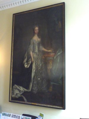 A formal portrait in the entrance hall.