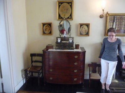 Our guide, Karen, explaining the significance of these unusual wall decorations on the second floor at the top of the stairs.