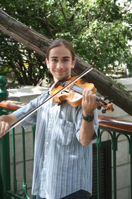 A friendly violinist plays a tune.