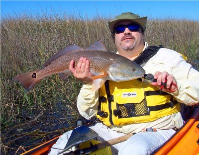 Eric D. with his 1st  big Redfish at 28