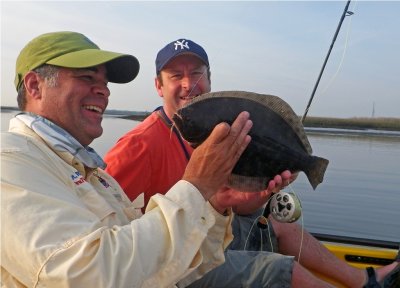Rich & Brian with a 17-1/2 fly caught  Flounder