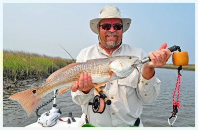 Keith from Texas with a 6 lb. Redfish on fly