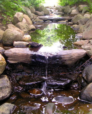 A waterfall at the Pepsi Headquarters sculpture gardens