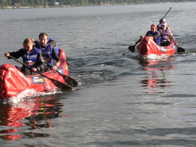 Every second counts. Two teams race towards shore.