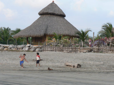 Kids play along the beach