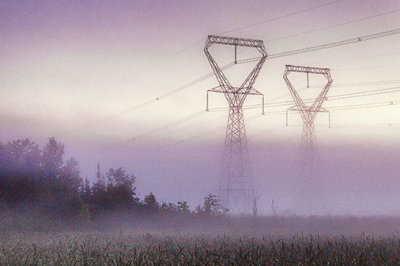 Transmission Towers Rising Above Fog 25964