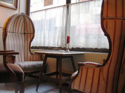 The walnut chairs in the sweets shop