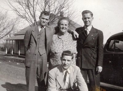 Hall Brothers - Jack kneeling, Hack left and Mack -- with Grandma Caldwell -- mid 40s