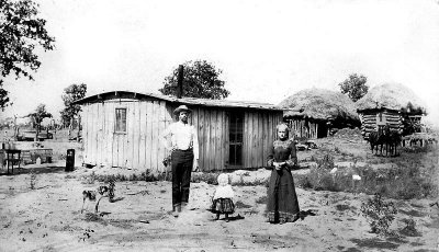 Lafe and Effa Schoonover with son Jess on Oklahoma Land Rush Homestead - About 1900