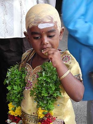 Young girl who just got her hair cut in the temple.