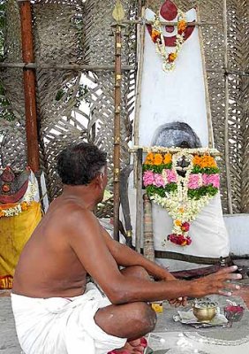 This Christian shaman practises with the help of the Dravidian God Sudalai. Tirunelveli District, Tamil Nadu.
