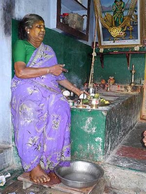 Diviner with offerings for the Gods on her altar. Tirunelveli District, Tamil Nadu.