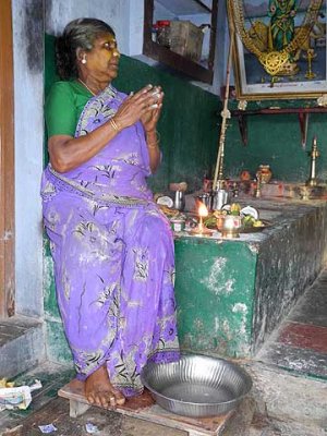 Diviner praying to the Gods, before she starts a ceremony. Tirunelveli District,n Tamil Nadu.