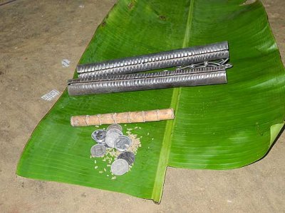 Kani shamanism. 2 kokkaras and a bamboo stick are needed for the ceremony. Tirunelveli District, Tamil Nadu.