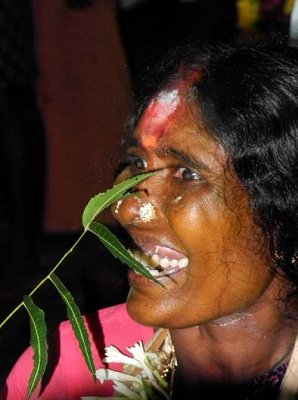 Woman in a trance at Mulaipari festival at Koovathupatti Tamil Nadu. http://www.blurb.com/books/3782738