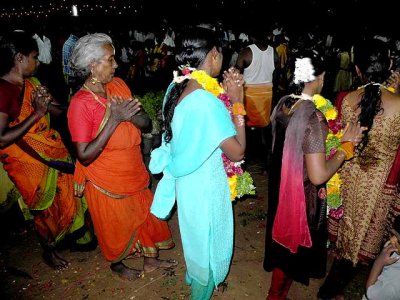 Finally the women dance in a circle around the Mulaipari pots. Mulaipari festival at Koovathupatti, Tamil Nadu. 
