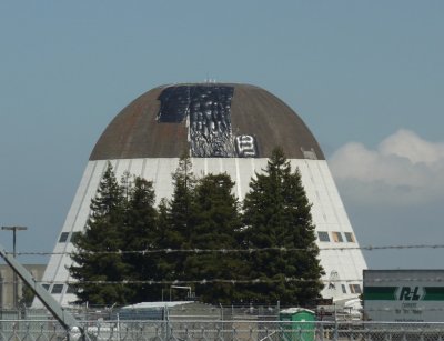 The beginning of the shedding of Hangar One