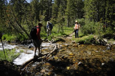 Dave crossing the rushing creek
