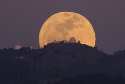 The Full Worm Moon Rising behind Lick Observatory