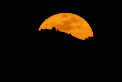 The Grass Moon Rising behind Lick Observatory
