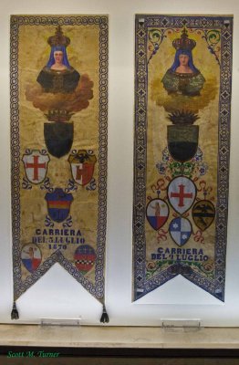 Two of the flags displayed when the Contrada wins the Palio