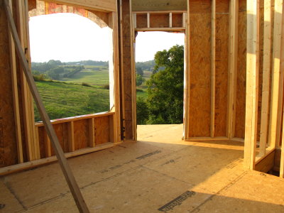A better view of the guest room's window and back door