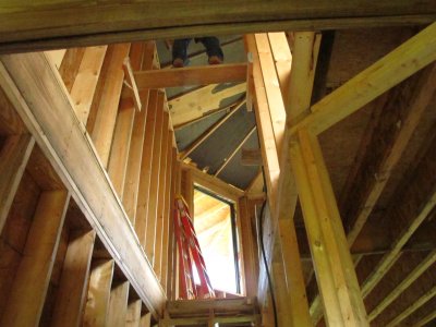 The crew that puts the insulation in the ceiling is scaring me.  Look where he's standing!