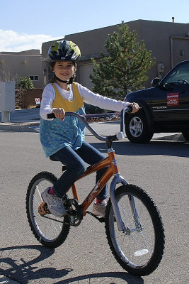Lucy Riding Her New Bike
