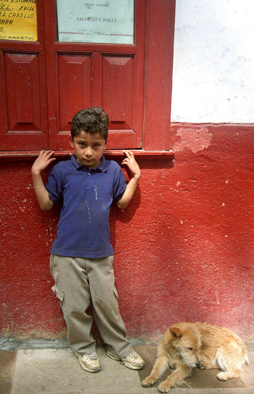 boy and his dog in Cotija, Mexico