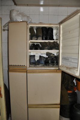 Repurposing broken fridget into shoe closet