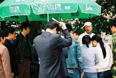 Combing hair before having a picture taken