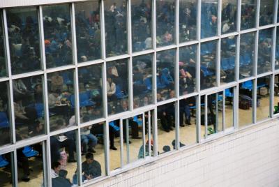 Waiting for the train in the public seating area, Huangzhou station