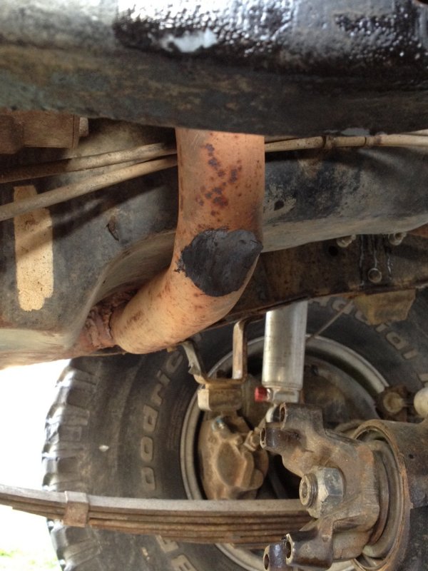 U-joint  hitting exhaust from old worn springs