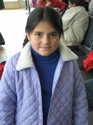 A Peruvian girl with beautiful eyes and hair.