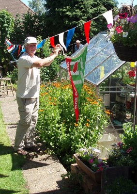 Ken's in charge of bunting - Imbibo Ergo Sum - Chris's flag is hoisted