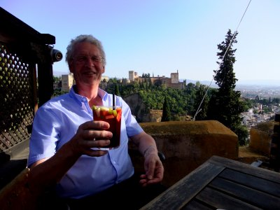 Granada: Mick with sangria overlooking Alhambra from a lovely little cafe